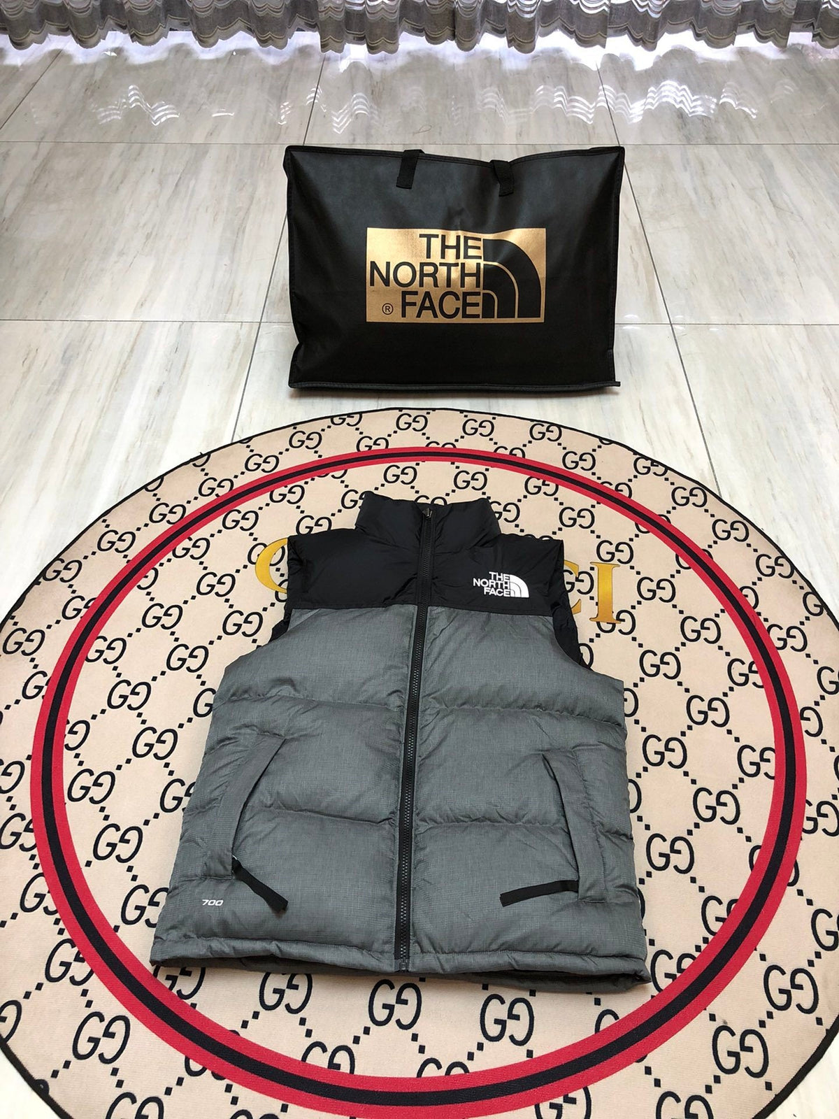 The North Face Puffer Vest in Gray and Black with Stand Collar